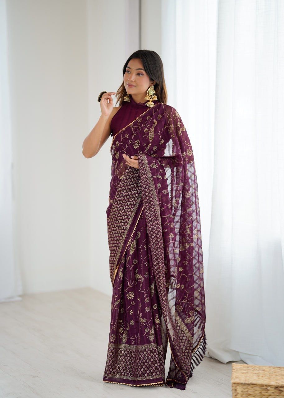Royal Elegance in Purple Saree with Golden Detailing