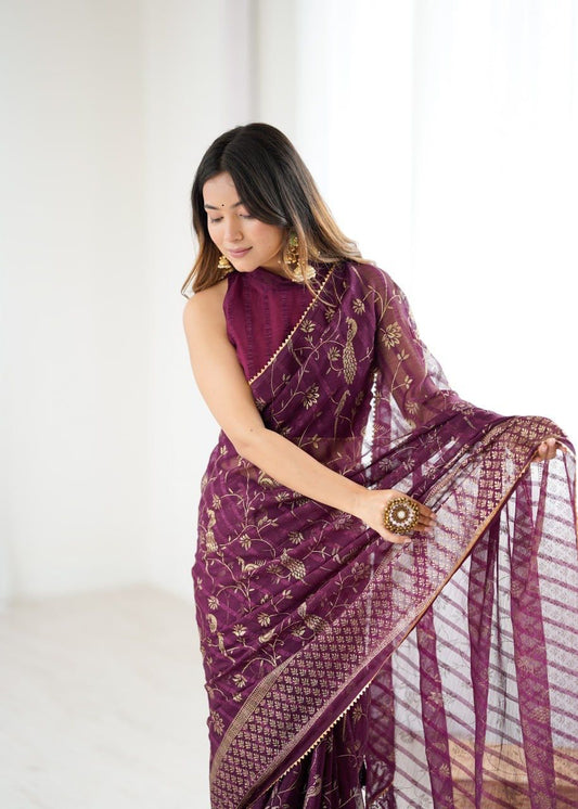 Royal Elegance in Purple Saree with Golden Detailing