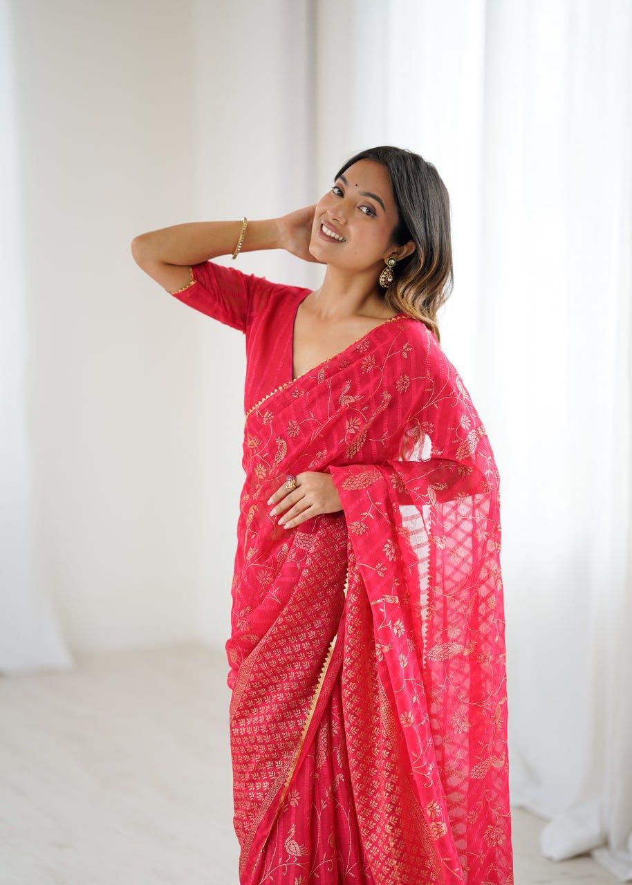 Radiant Beauty in Bright Pink Saree with Golden Embroidery