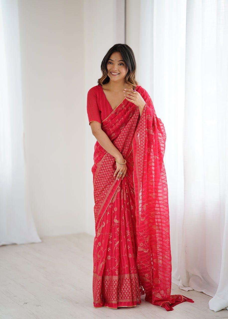 Radiant Beauty in Bright Pink Saree with Golden Embroidery
